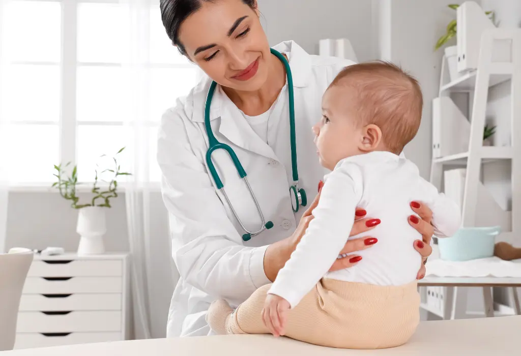 Pediatric emergency care doctor examining a baby